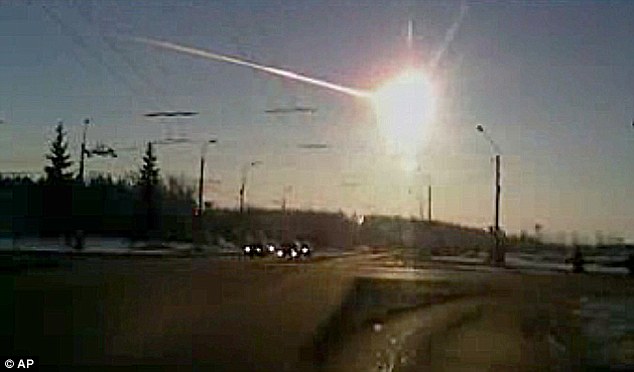 In this frame grab made from dashboard camera video, a meteor streaks through the sky over Chelyabinsk, about 1500 kilometers (930 miles) east of Moscow on Feb. 15, 2013